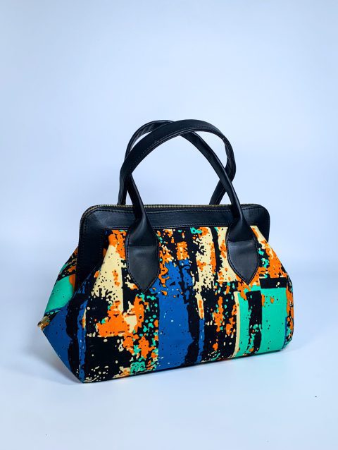 Discover our collection of handmade Ankara bags featuring vibrant African prints. From stylish crossbody bags for women to luxury handbags for everyday use, we offer colorful Ankara tote bags perfect for work and travel. Explore durable African print laptop bags, fashionable purses with unique patterns, and custom handbags designed for modern fashion lovers. Our selection includes traditional Ankara backpacks, elegant clutch bags for special occasions, and premium-quality designs made in Nigeria. Elevate your style with authentic Ankara accessories crafted for versatility and durability.
